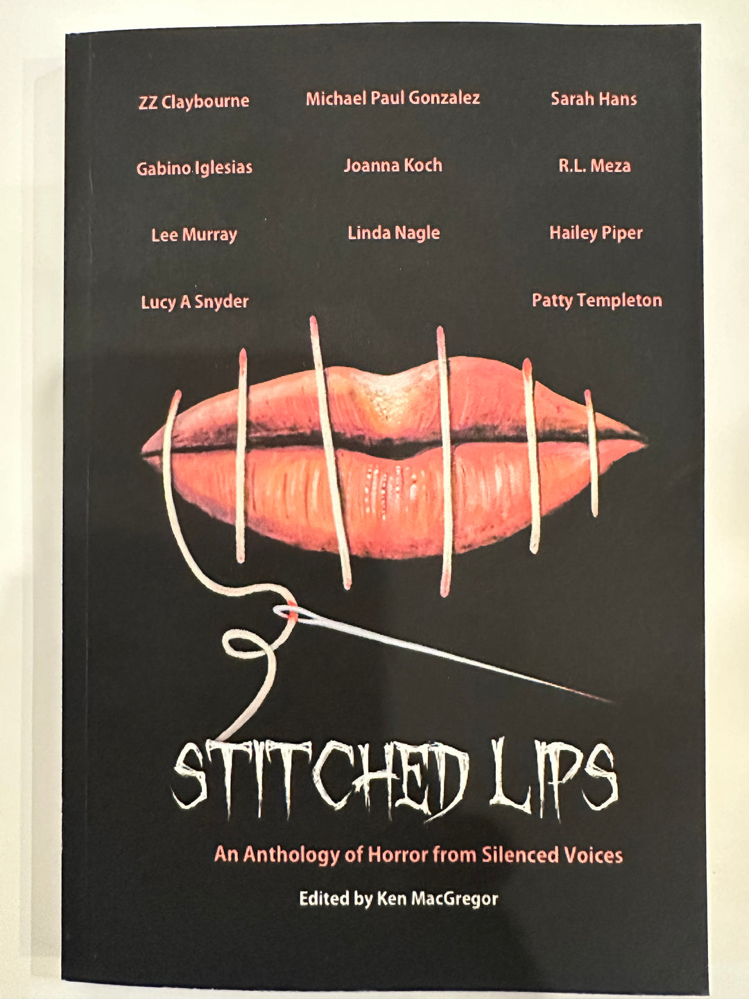 Stitched Lips- Edited by Ken MacGregor