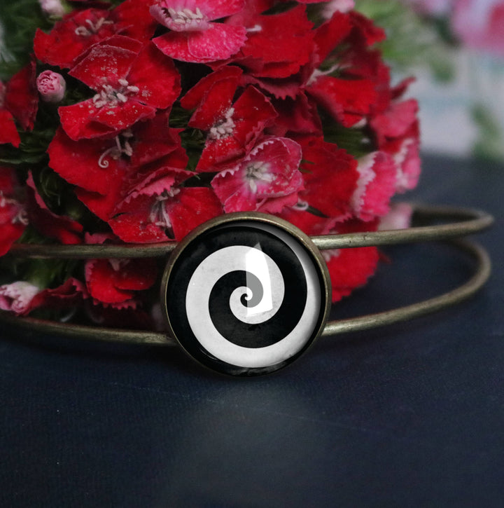 The Divine Iguana - Black and White Spiral Glass Cabochon Cuff Bracelet