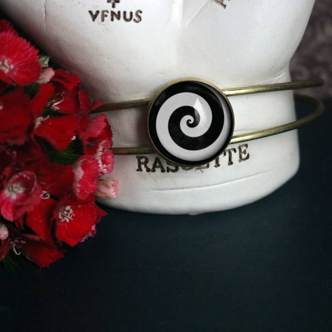 The Divine Iguana - Black and White Spiral Glass Cabochon Cuff Bracelet