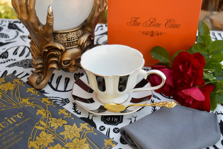 Black and White Teacup and Saucer