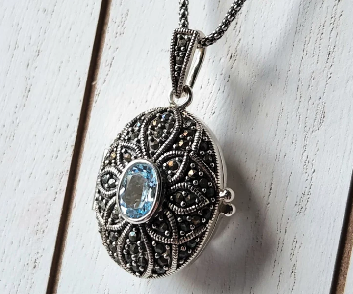 Silver Insanity - Oval Blue Topaz Locket Pendant Sterling Silver Necklace