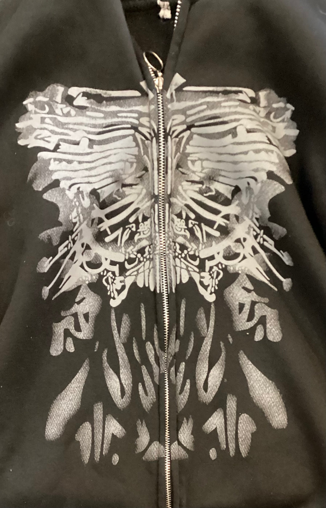 Long Sleeve Hoodie with Abstract Winged Skull Motif-Scott