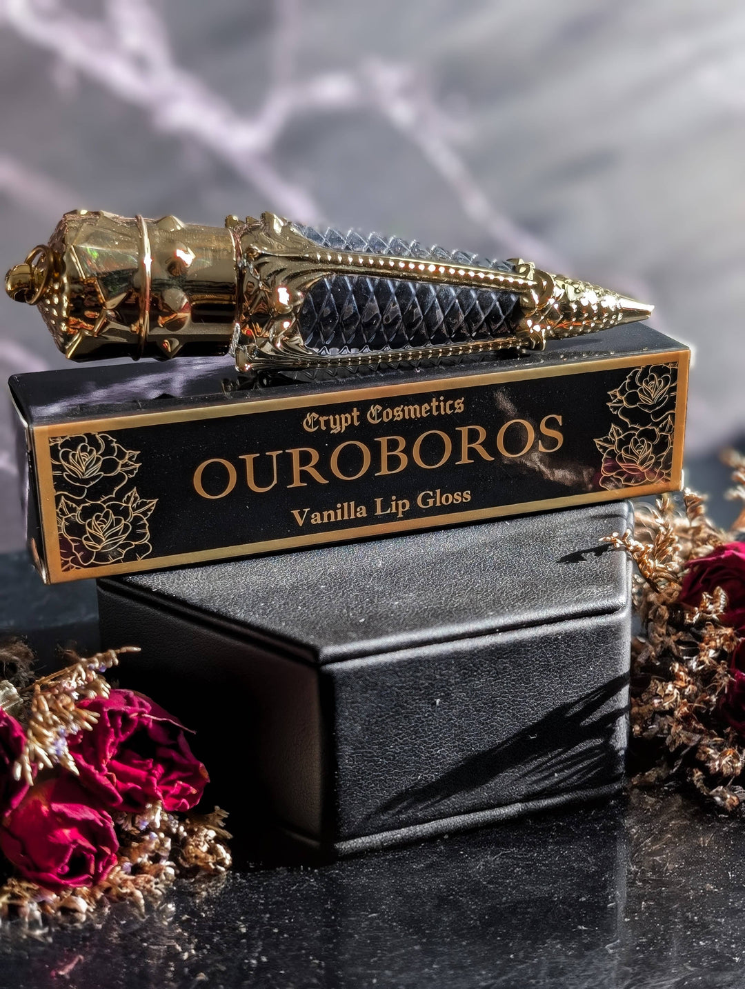 Crypt Cosmetics - OUROBOROS - Black colored vanilla lip gloss