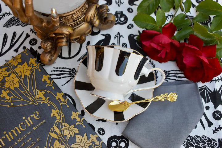 Black and White Teacup and Saucer